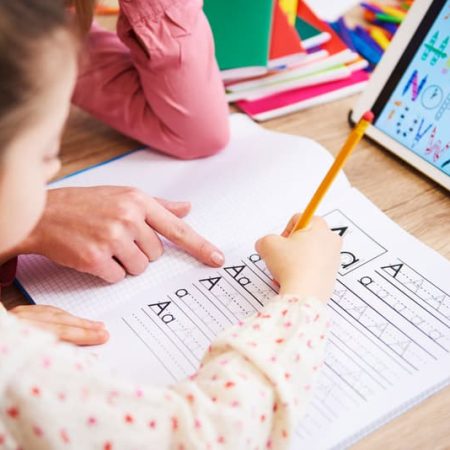 close-up-of-mother-helping-her-child-with-homework-234SWAL.jpg close-up-of-mother-helping-her-child-with-homework-234SWAL.jpg